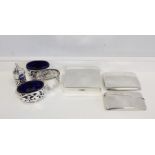 Two silver cigarette cases, a card case and four pierced condiments. 9oz.