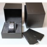 Gucci lady's stainless steel "Twirl" bracelet watch with bronzed dial and diamond set bezel, model