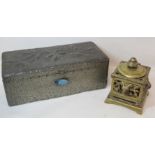 Arts and Crafts pewter foiled box of rectangular form, the hinged lid with relief floral spray,