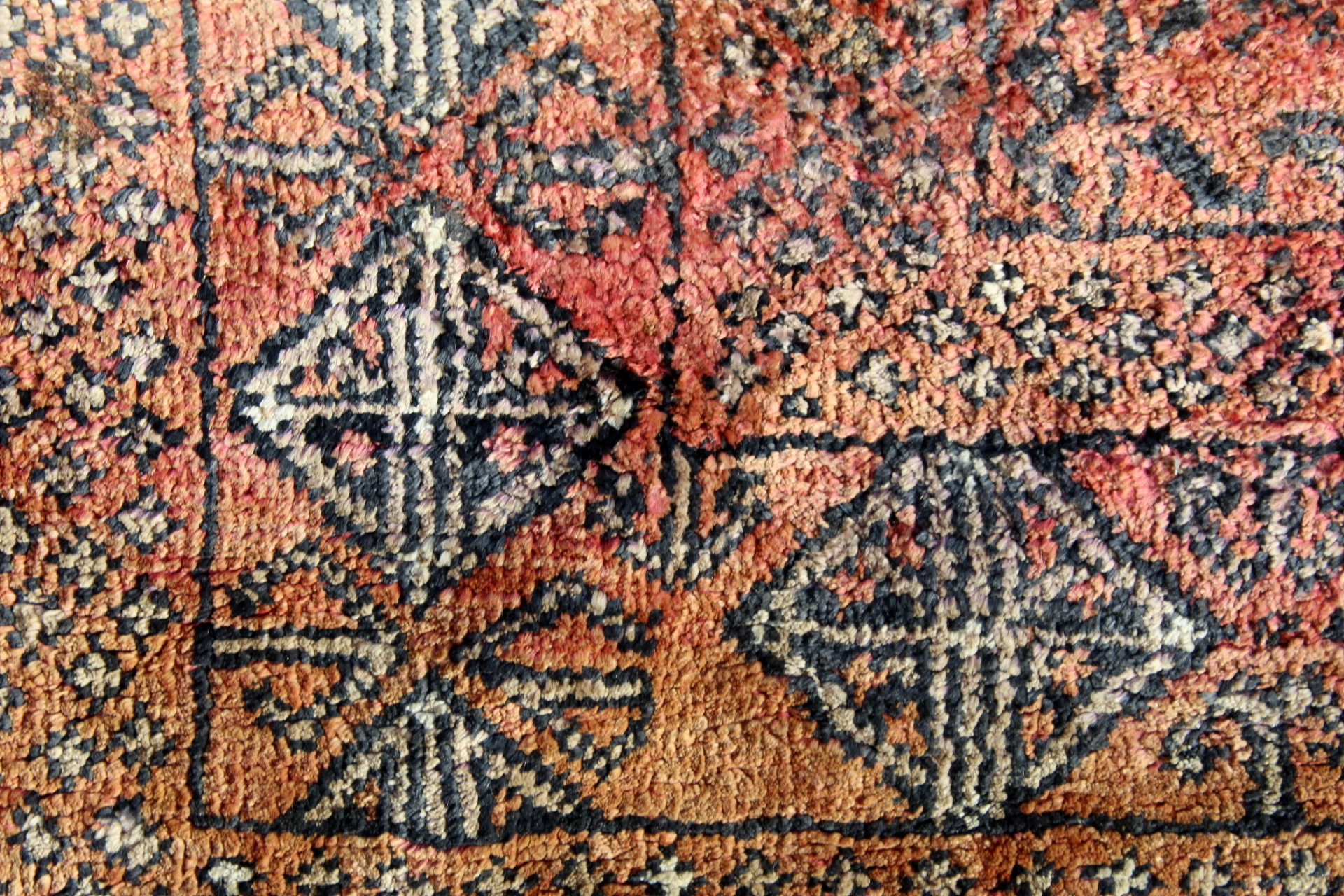 Persian silk on cotton rug, the teracotta field with three rows of octagonal guls, 208cm x 116cm. - Image 10 of 10