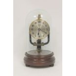 Bulle electric mantel timepiece of typical style, with silvered dial on mahogany base with dome.