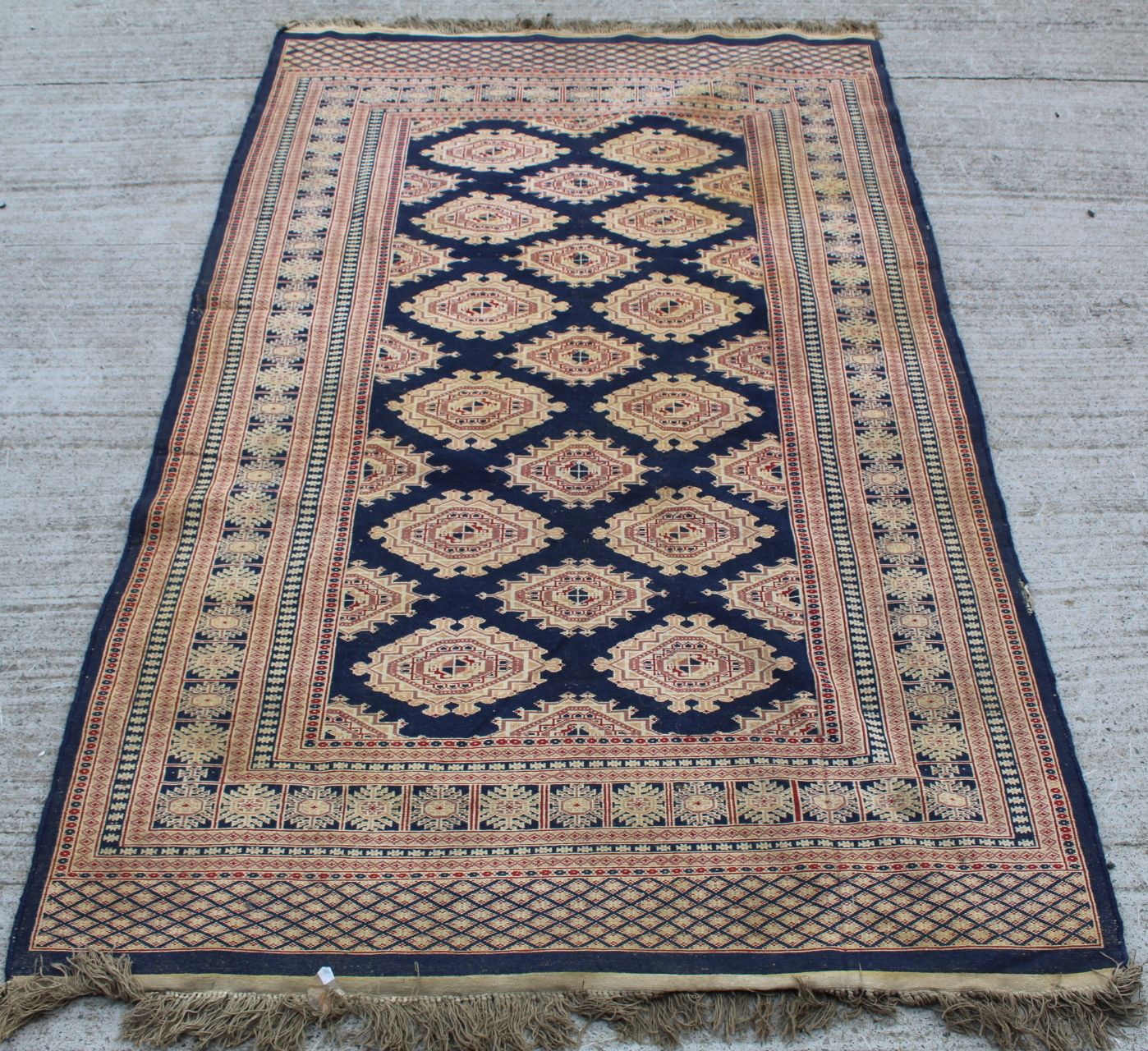 Eastern wool rug with multiple hooked octagonal medallions on blue field, 201cm x 124cm. - Image 6 of 12