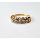 Victorian diamond five-stone half hoop ring, old-cut brilliants, in gold, size Q.
