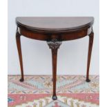 Edwardian mahogany demi-lune card table, the moulded hinged top enclosing baize lining, plain