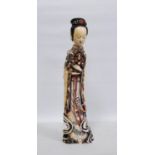 Chinese early 20th century polychrome carved and painted ivory figure of Quan Yin holding a basket