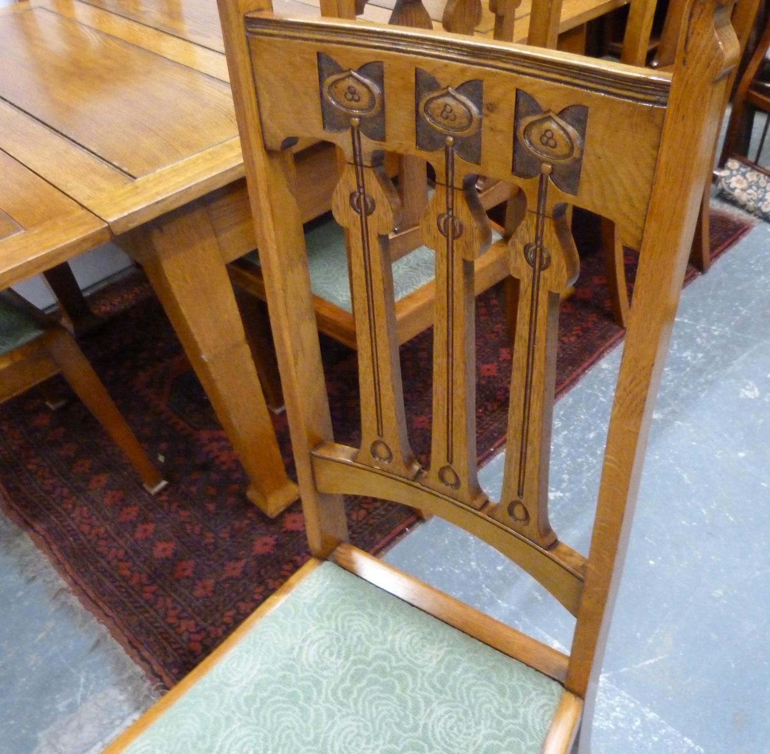 Oak Art Nouveau style dining room suite comprising a dresser, the upper section enclosed by glazed - Image 8 of 8