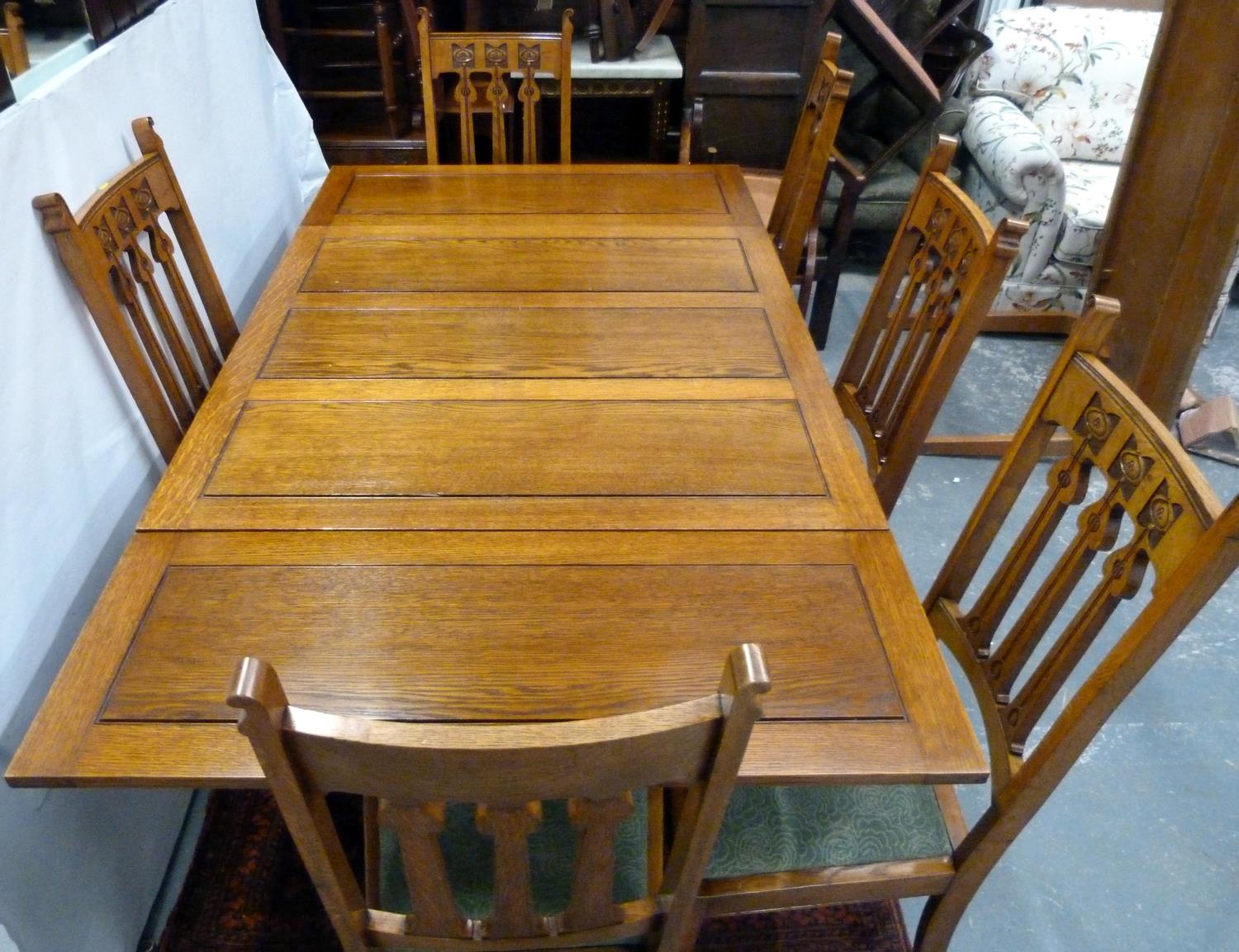 Oak Art Nouveau style dining room suite comprising a dresser, the upper section enclosed by glazed - Image 6 of 8