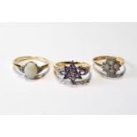 Opal cluster ring, another, and a tanzanite ring, all 9ct gold.  (3)