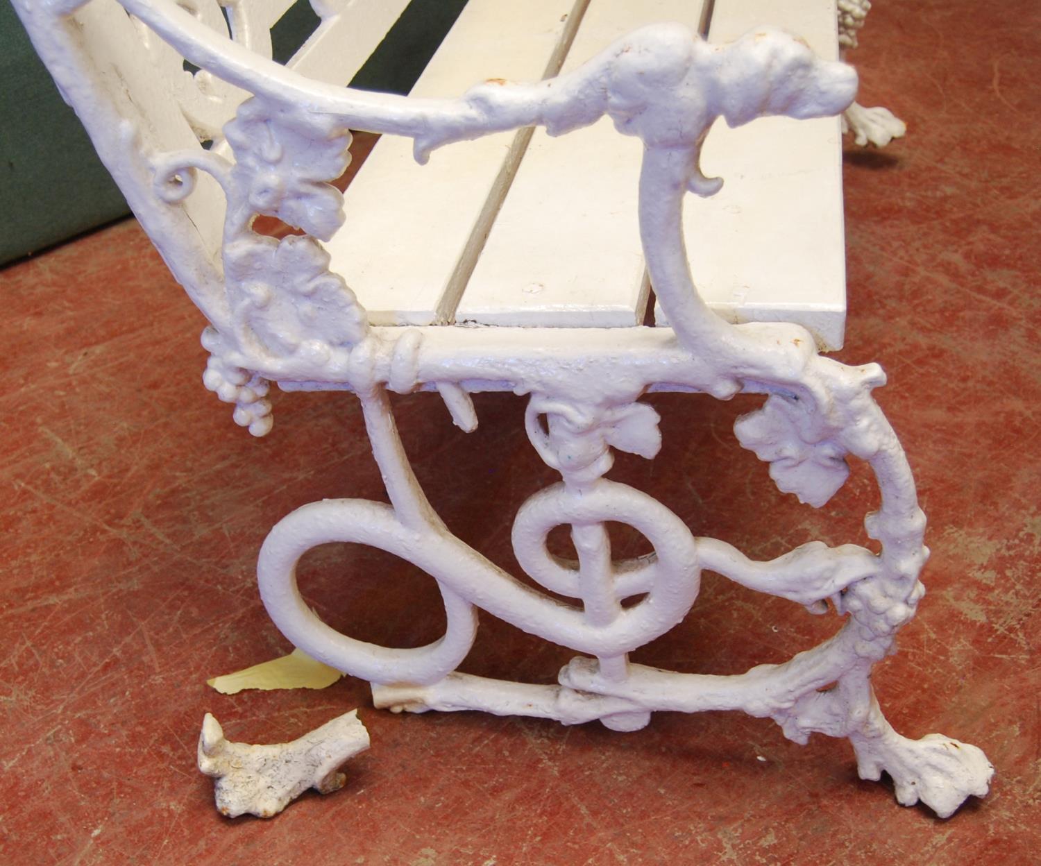 19th century cast iron garden bench, the fretwork back over scrolling vine leaf decoration, the arms - Image 2 of 4