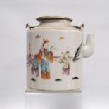 Canton famille rose teapot decorated with children and their teacher, marks to the base, 14cm high.