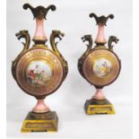 Pair of 19th century porcelain and ormolu garnitures, each with dragon mask handles, circular