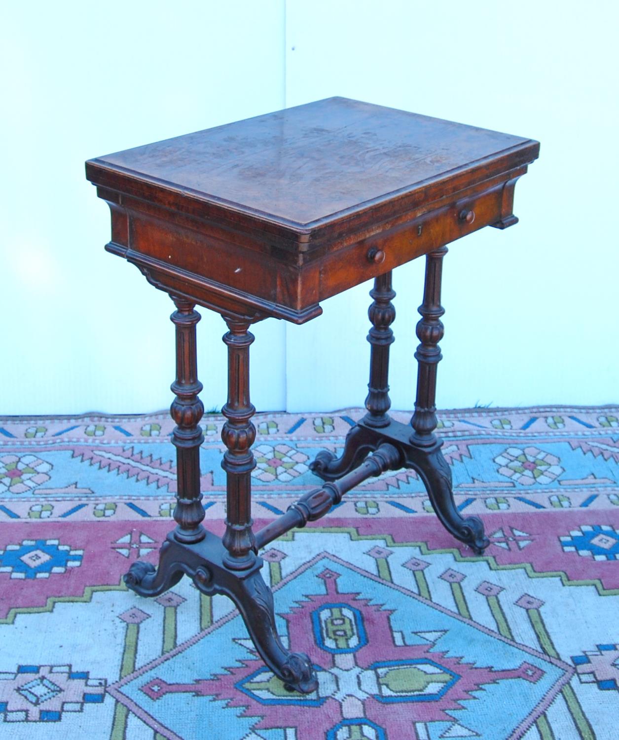 Late Victorian walnut games table, the hinged moulded rectangular top enclosing chequer board over - Image 2 of 5