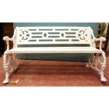 19th century cast iron garden bench, the fretwork back over scrolling vine leaf decoration, the arms