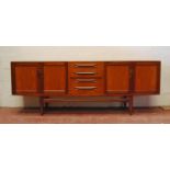 Kofod-Larsen for G Plan sideboard, the rectangular top over four short drawers flanked by cupboards,
