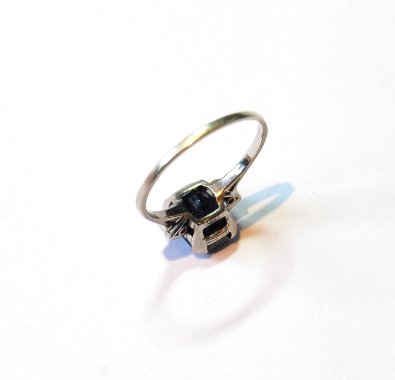 Ring with rectangular sapphire flanked by two baguette diamonds, in platinum, size O½. - Image 3 of 3