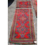 Turkoman rug, the four diamond and cruciform motifs over red ground and border (cut into two