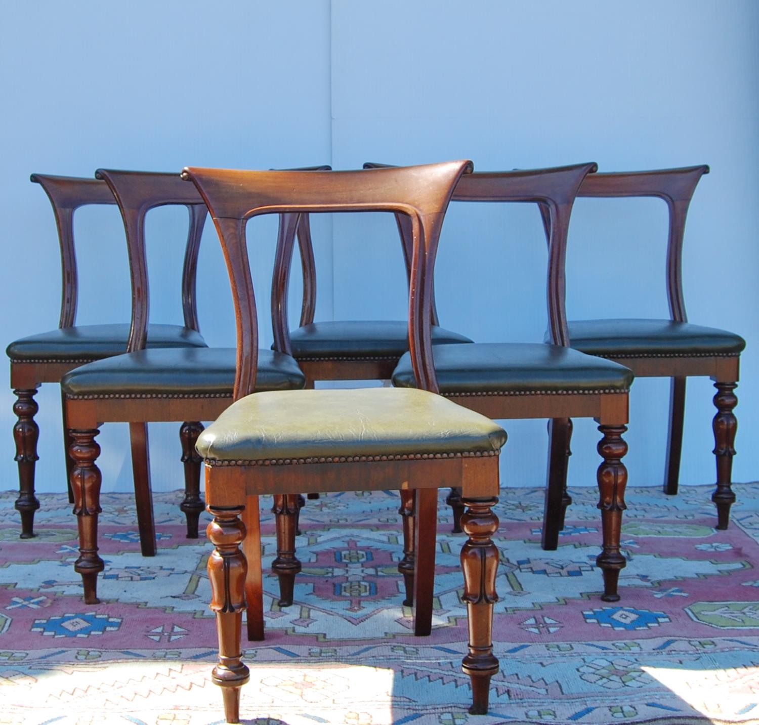 Set of six mid-19th century mahogany dining chairs, each with curl over top rail, open back, stuff- - Image 3 of 4