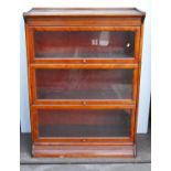 Mahogany stacking bookcase, the three sections each with glazed fronts, on plinth base, 87cm wide,