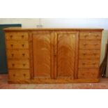 Mahogany gentleman's compactum in the manner of Gillows, the rounded rectangular top over two