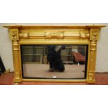 William IV giltwood overmantel mirror, the projected inverted breakfront cornice over reeded half
