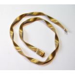 Gold necklace of flat Milanese pattern, '750', 38g.