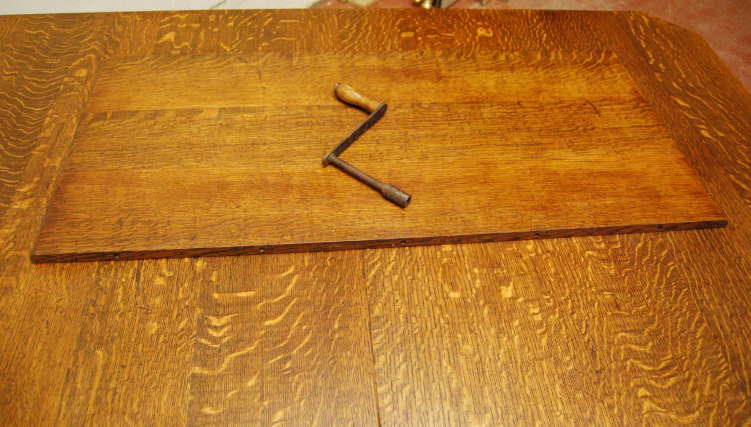 Late Victorian oak extending dining table, the moulded rectangular top with canted corners, on - Image 4 of 4