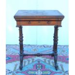 Late Victorian walnut games table, the hinged moulded rectangular top enclosing chequer board over