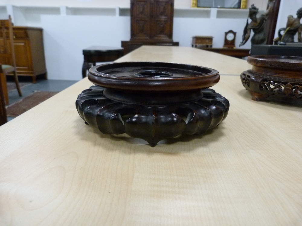 Eight oriental carved wooden stands. - Image 7 of 7