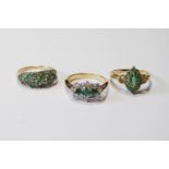 Three 9ct gold rings with emeralds.