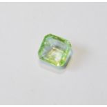 Unmounted square emerald with NGL report, given as 8.65ct, 12.24mm x 7.26mm, treated, of almost lime