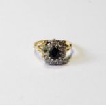 Diamond and sapphire oval cluster ring in gold, probably 18ct (one diamond missing, two replaced
