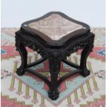 Oriental hardwood and marble jardinière stand, the serpentine square top with pink marble inset over