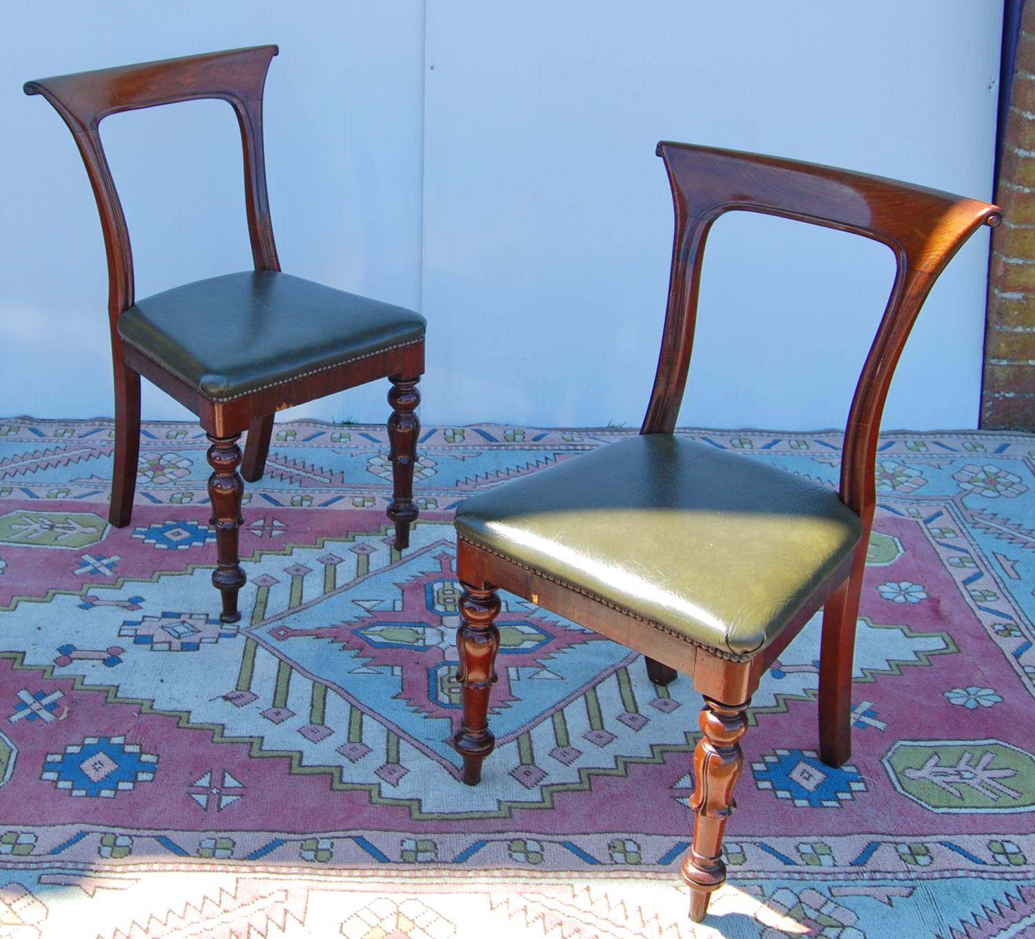 Set of six mid-19th century mahogany dining chairs, each with curl over top rail, open back, stuff- - Image 2 of 4