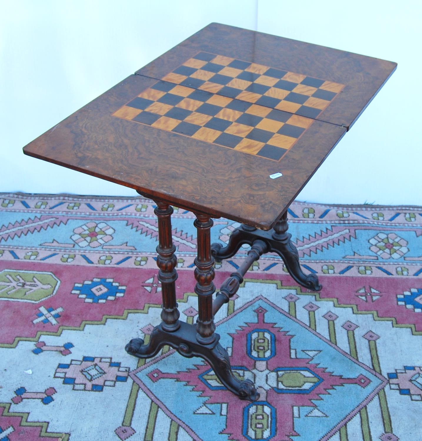 Late Victorian walnut games table, the hinged moulded rectangular top enclosing chequer board over - Image 4 of 5