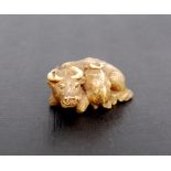 19th century ivory netsuke of a water buffalo and calf, 4cm.