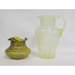 Loetz-style glass vase, 11cm high, also a vaseline-style jug with floral decoration, 23cm high.  (2)