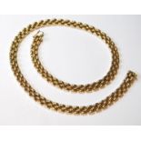 9ct gold necklace of rounded brick pattern, 32g.