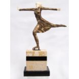 Art Deco figure of a young lady ice skating, her head back with arms outstretched and on one leg,
