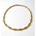 18ct gold necklace of knotted tubular form, 47g.