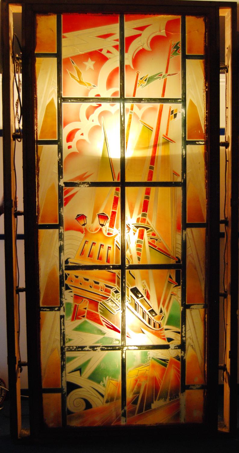 Large Art Deco painted glass cinema panel depicting a sailing ship, decorated in greens and oranges,