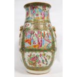 Canton famille verte vase decorated with panels depicting figures, blossom, butterflies and birds,