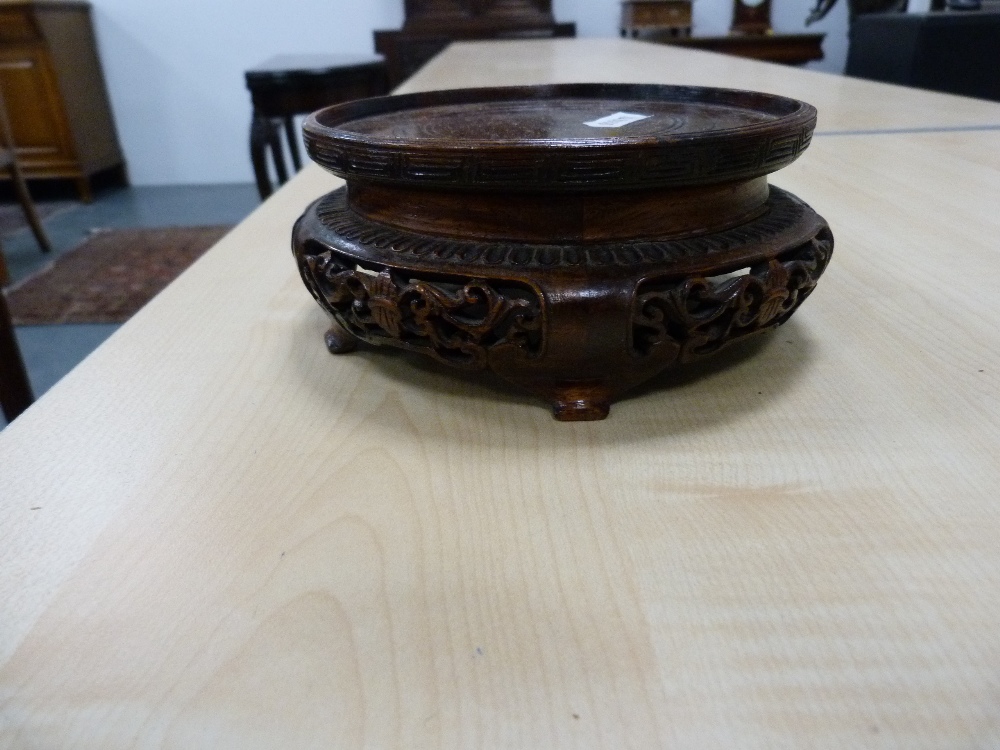 Eight oriental carved wooden stands. - Image 6 of 7