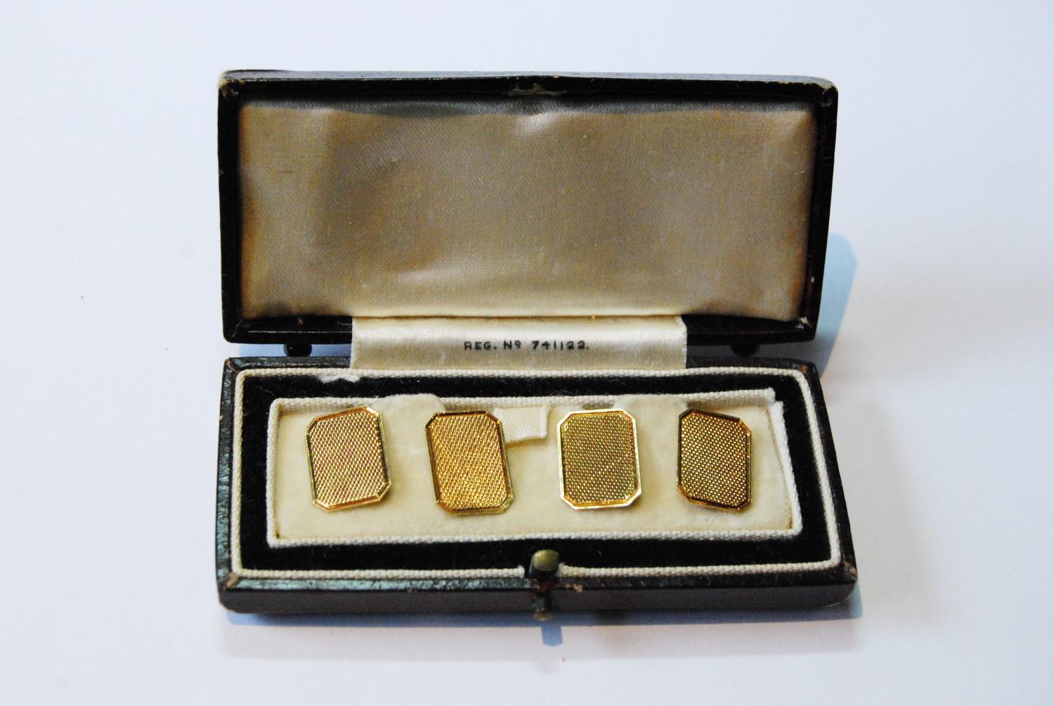 Pair of 18ct gold cufflinks, rectangular engine-turned, 6g.