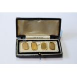 Pair of 18ct gold cufflinks, rectangular engine-turned, 6g.