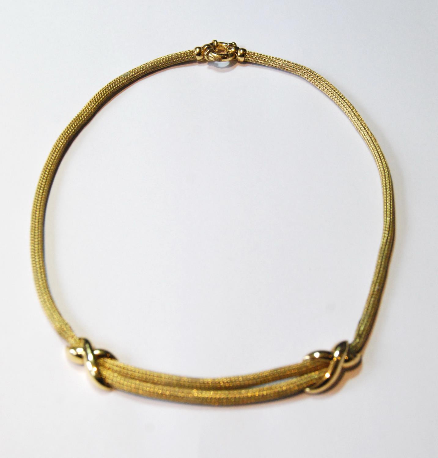 Gold cord necklace with two figure of eight links, '750', 25g.