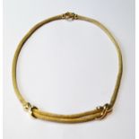 Gold cord necklace with two figure of eight links, '750', 25g.