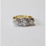 Diamond three-stone ring with old-cut brilliants, approximately 1.5ct and .75ct, '18ct plat', size