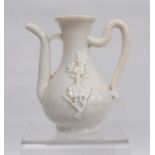 19th century blanc de Chine small vase with loop handle, the body with applied cherry blossom