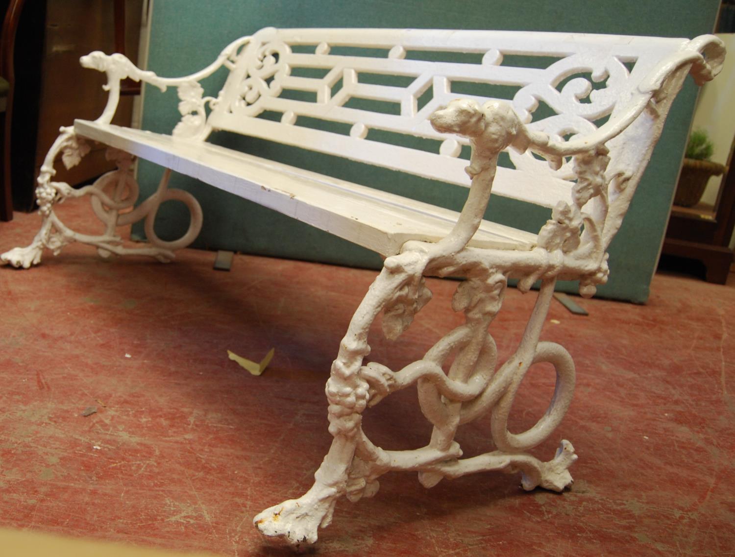 19th century cast iron garden bench, the fretwork back over scrolling vine leaf decoration, the arms - Image 3 of 4