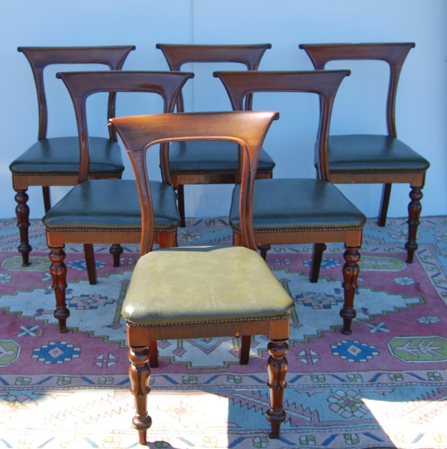 Set of six mid-19th century mahogany dining chairs, each with curl over top rail, open back, stuff- - Image 4 of 4